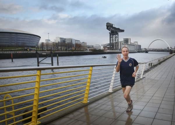 New Scottish Labour leader Jim Murphy goes for a run on the banks of the River Clyde. Picture: PA