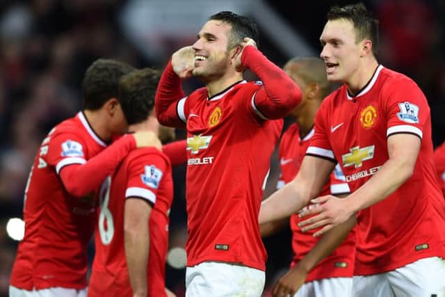 Robin van Persie celebrates scoring the third goal. Picture: Getty