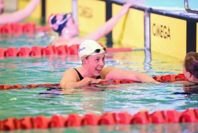 Hannah Miley is all smiles after winning the 400m Individual Medley in Edinburgh. Picture: SNS