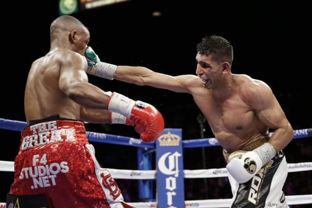 Amir Khan lands a solid right jab on the face of Devon Alexander during his convincing victory in Las Vegas at the weekend. Picture: AP