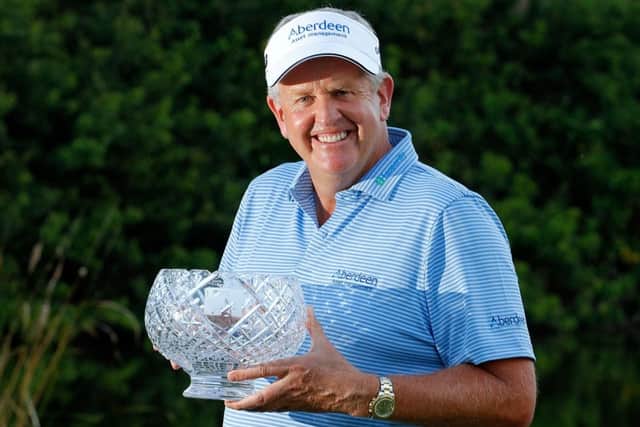A delighted Colin Montgomerie with the John Jacobs Trophy yesterday. Picture: Getty