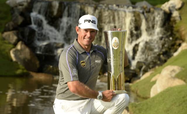 Lee Westwood poses with the trophy after claiming the Thailand Golf Championship for the second time. Picture: Getty Images