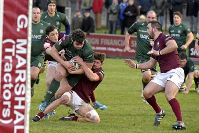 Hawicks Shawn Muir on a charge in the despite the close attentions of the Gala defence. Picture: Rob Gray