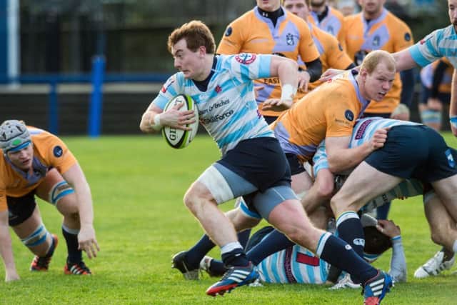 Edinburgh Accies scrum-half James Munro goes on a run from the base of a ruck. Picture: Ian Georgeson