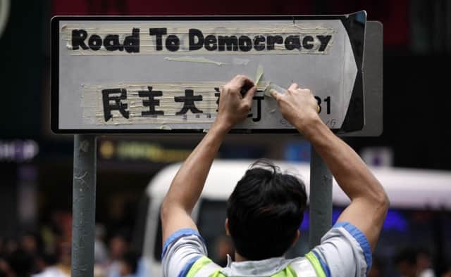 Signs original functions are restored in Hong Kongs premier shopping district after protestors are removed. Picture: Getty