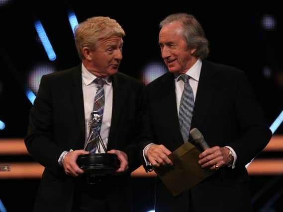 Gordon Strachan, with Sir Jackie Stewart, says he can identify with the stress Ally McCoist is feeling. Picture: PA