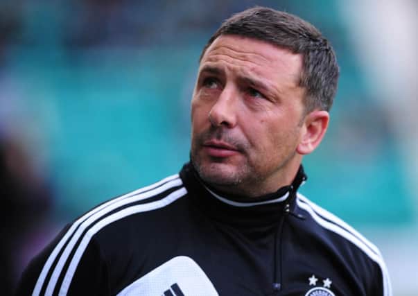 Aberdeen manager Derek McInnes is delighed Aberdeen are debt free for the first time in two decades . Picture: Ian Rutherford