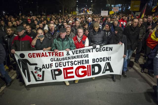 More than 15,000 demonstrated against criminal asylum seekers in a show of strength by farright movement Pegida. Picture: AFP/Getty