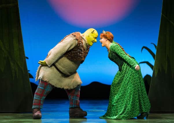 Dean Chisnall (Shrek) and Faye Brookes (Princess Fiona) star in Shrek the Musical. Picture: Contributed
