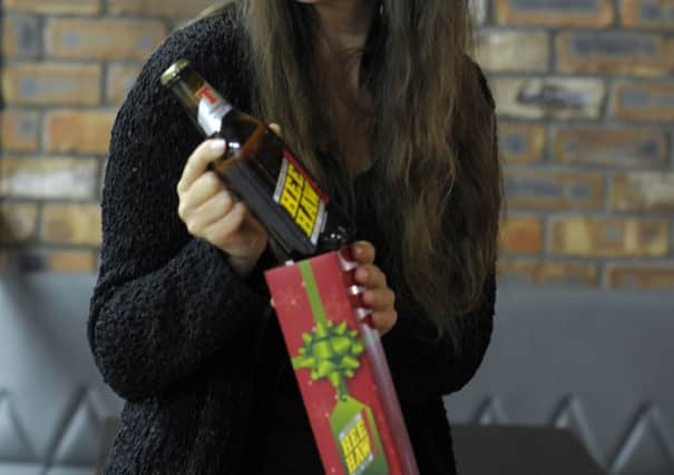 Tennents will be handing out gift-wrapped bottles of their delicious alcohol-free lager, Hee Haw. 

Picture: Andy Buchanan