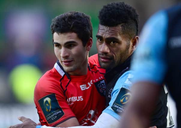 Disappointment for Glasgows Niko Matawalu, right, as he embraces Nicolas Bezy after the narrow home defeat. Picture: Getty