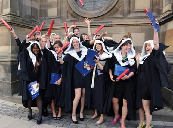 Students such as these Edinburgh graduates helped boost the universitys profile. Picture: Ian Rutherford