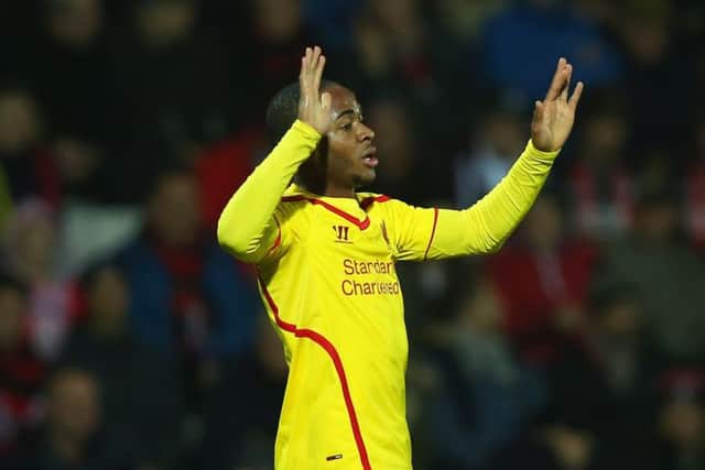 Twogoal Raheem Sterling celebrates after scoring Liverpools opener against Bournemouth. Picture: Getty