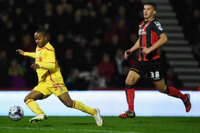 Baily Cargill keeps a close eye on Liverpool's Raheem Sterling. Picture: Getty