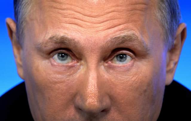 In his year-end report, Vladimir Putin tried to reassure his home audience that the roubles troubles were temporary. Picture: Getty
