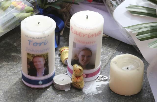 Candles outside the Lindt cafe where Tori Johnson and Katrina Dawson died alongside gunman Man Haron Monis. Picture: AP