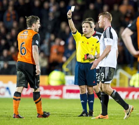 Paul Paton, left, will miss Dundee United's games against Celtic and St Johnstone. Picture: SNS