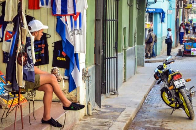 The laid-back charm of Cuba will soon change as dollar-rich American tourists start to flood in. Picture: Getty