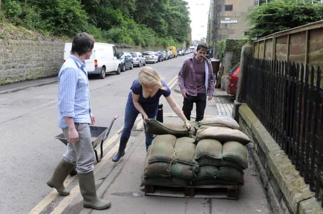 People whose homes are at risk relieved that agreement has been reached over insurance. Picture: Greg Macvean
