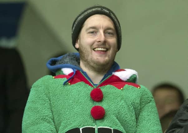 St Johnstone fan sports a Christmas jumper at a recent match. Picture: SNS