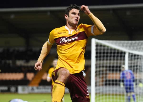 Motherwell's John Sutton celebrates after putting his side 1-0 up. Picture: SNS