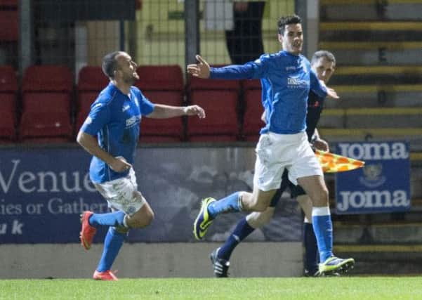 St Johnstone's Brian Graham  (right) celebrates after putting his side 1-0 up. Picture: SNS