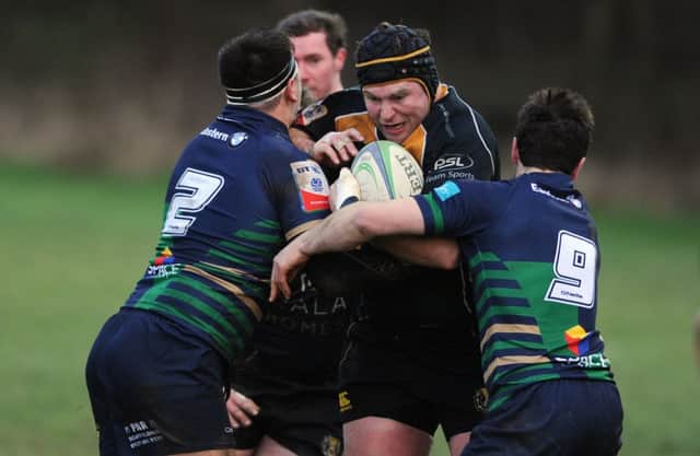 Curries John Cox has his path blocked by Boroughmuir pair Cal Davies and Johnny Adams at Malleny Park on Saturday. Picture: Neil  Hanna