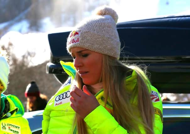 Lindsey Vonn nurses her right elbow after yesterdays super-G crash at Val dIsère. Picture: AP