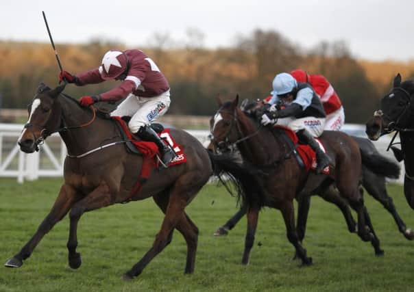 Davy Condon rode Bayan, left, to victory in The Ladbroke but was deemed to have used his whip too often. Picture: Getty