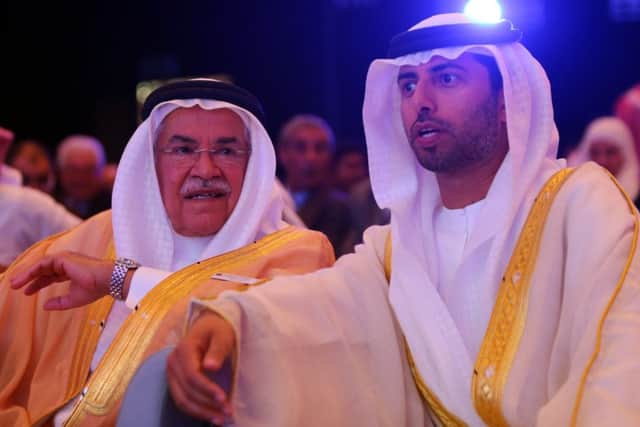 AlNaimi, left, with UAE energy minister at the Abu Dhabi meet. Picture: Getty