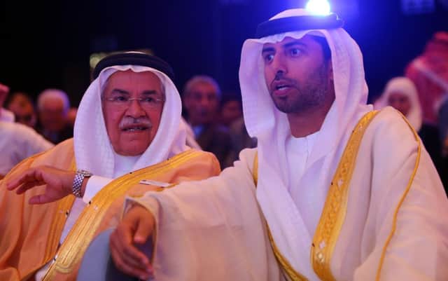 AlNaimi, left, with UAE energy minister at the Abu Dhabi meet. Picture: Getty