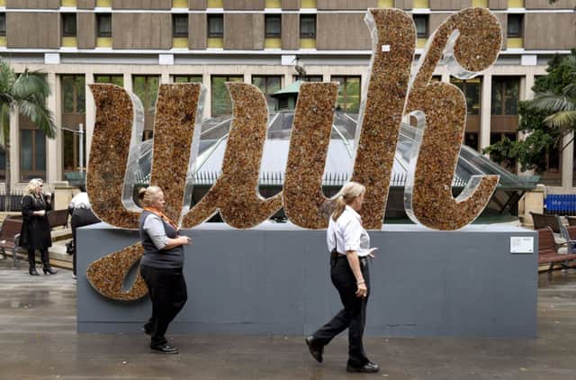 A huge sign made from cigarette butts makes its point in Sydney. Picture: Getty