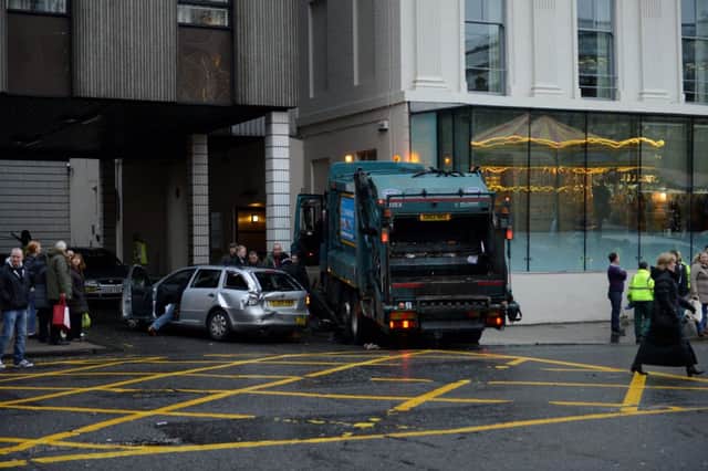 The bin lorry crashed into the Millennium Hotel. Picture: Hemedia