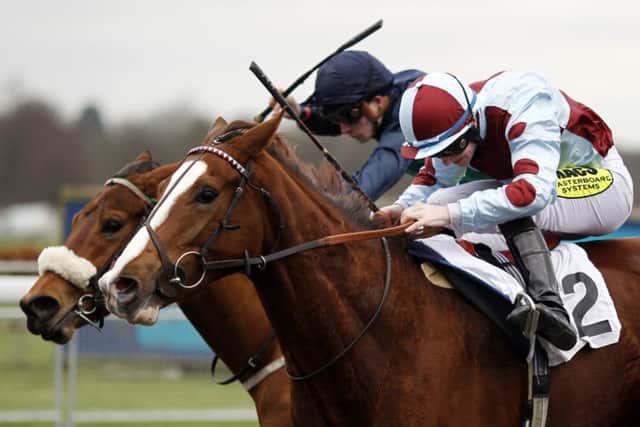 William Carson riding My Mistress (nearest) wins the Maiden Auction Fillies Stakes at Kempton yesterday. Picture: Getty Images