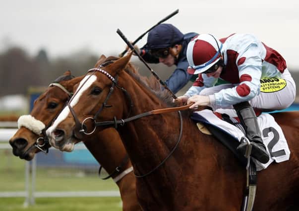 William Carson riding My Mistress (nearest) wins the Maiden Auction Fillies Stakes at Kempton yesterday. Picture: Getty Images