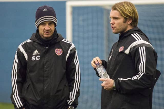 Robbie Neilson says his focus is solely on Hearts  not on the ongoing troubles at Rangers. Picture: SNS