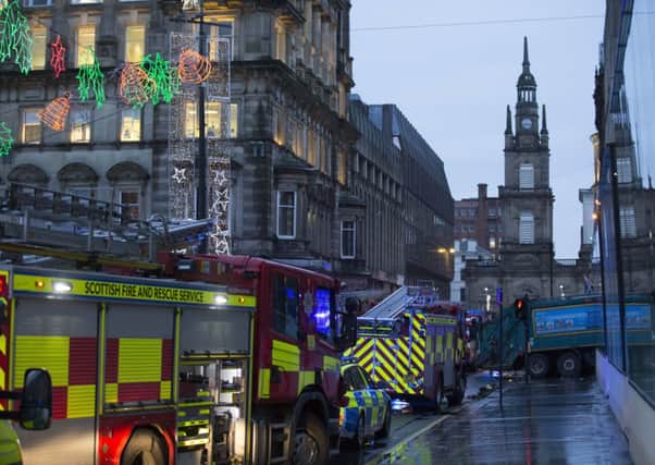 Emergency services at the scene where a bin lorry lost control. Picture: Robert Perry