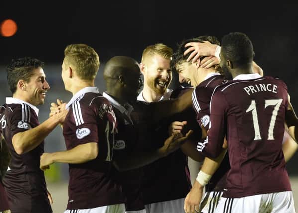 Callum Paterson (2nd right) celebrates after scoring the second goal. Picture: SNS