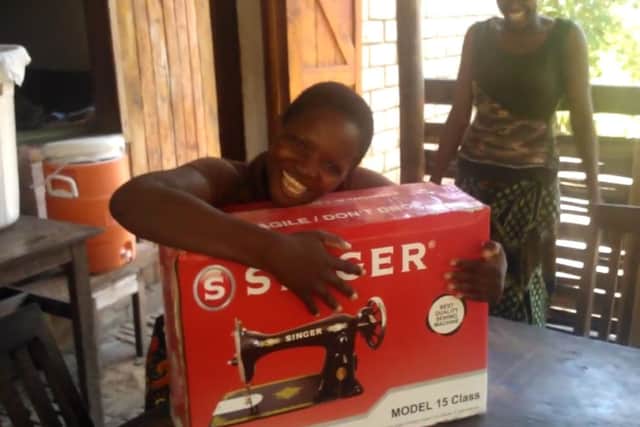 Malawi teenager Susan Banda receives her gift. Picture: Contributed