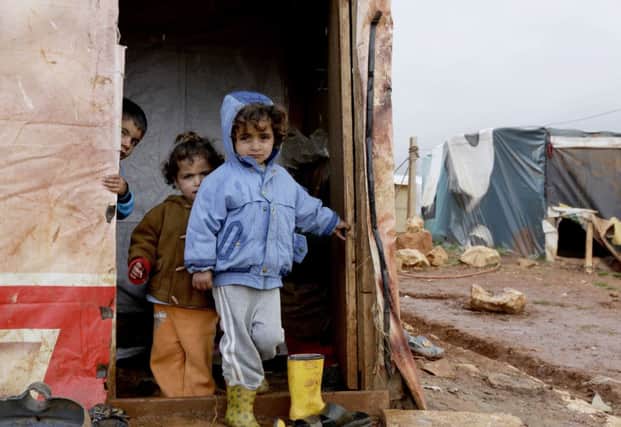 Children who fled the violence in northern Syria. Tens of thousands of Syrian refugees are set to suffer as winter sets in. Picture: AFP/Getty