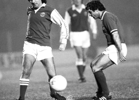 George Best is confronted by Rangers Tommy McLean during Hibs 2-1 win at Easter Road. Picture: SNS