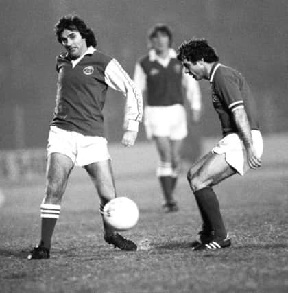 George Best is confronted by Rangers Tommy McLean during Hibs 2-1 win at Easter Road. Picture: SNS