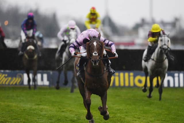 Noel Fehily drives the favourite Silviniaco Conti clear from the last to win the King George VI Chase at Kempton. Picture: Getty