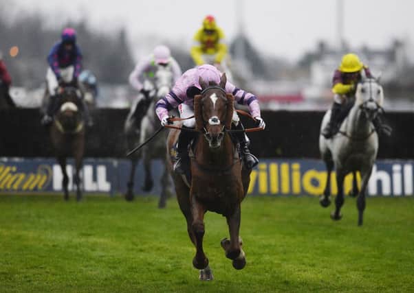 Noel Fehily drives the favourite Silviniaco Conti clear from the last to win the King George VI Chase at Kempton. Picture: Getty