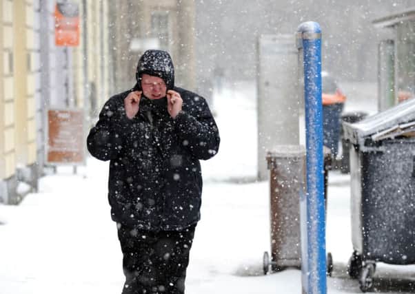 Travelling the streets can be hard when faced with snell (piercingly cold) winds and snow. Picture: TSPL