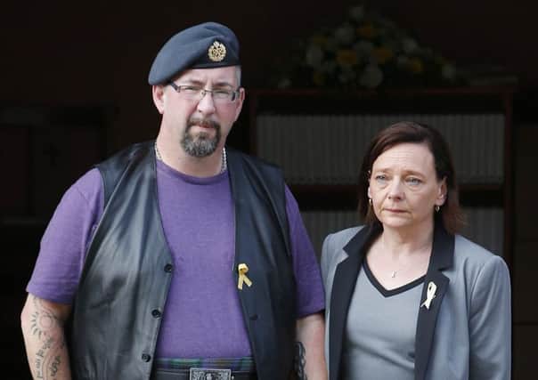 Mike Haines outside his brothers memorial service with Barbara Henning. Picture: PA