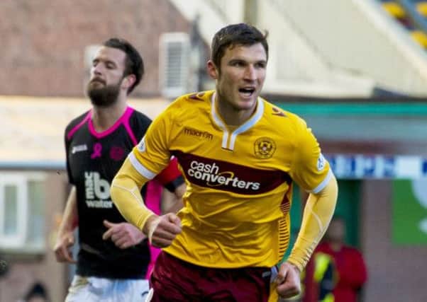Motherwell's John Sutton celebrates aftering putting his side 1-0 up. Picture: SNS