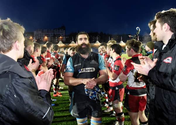 Edinburgh Rugby players applaud Glasgow at full-time. Picture: SNS
