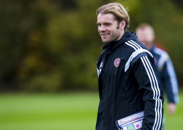 Hearts head coach Robbie Neilson is all smiles at training. Picture: SNS