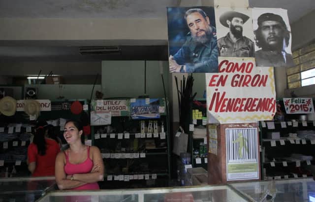 Havana shop displays pictures of Fidel Castro, Camilo Cienfuegos and Che Guevara. Picture: Reuters